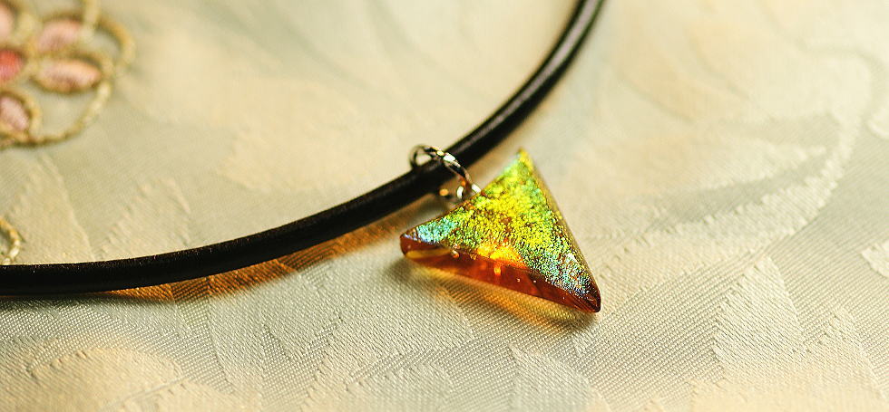 Dichroic triangle emblem